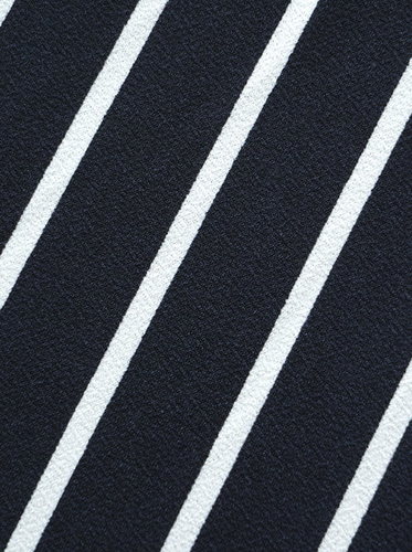 Rib knit fabric is a type of knit fabric that features a distinct, raised pattern of vertical ribs
